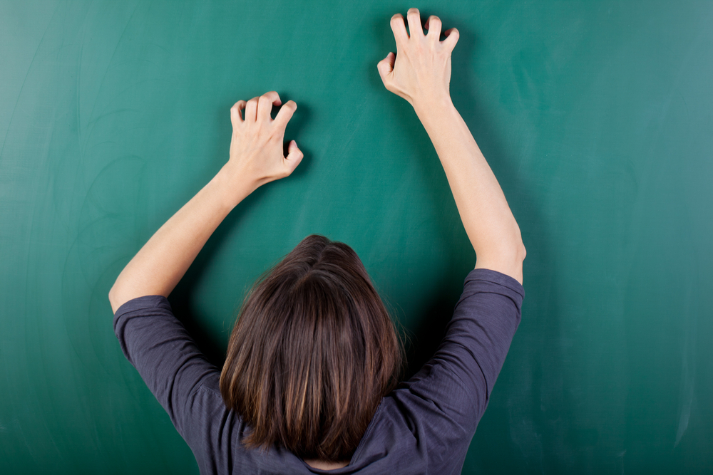 Why does scratching a chalkboard make you cringe?